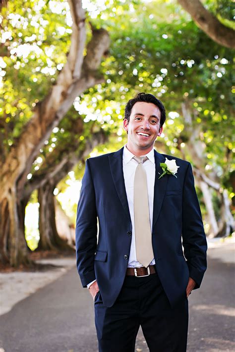 blue suit with champagne tie.